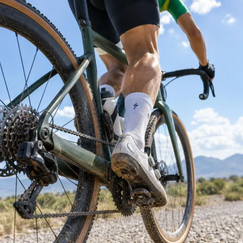 Cyclist pedaling a gravel bike